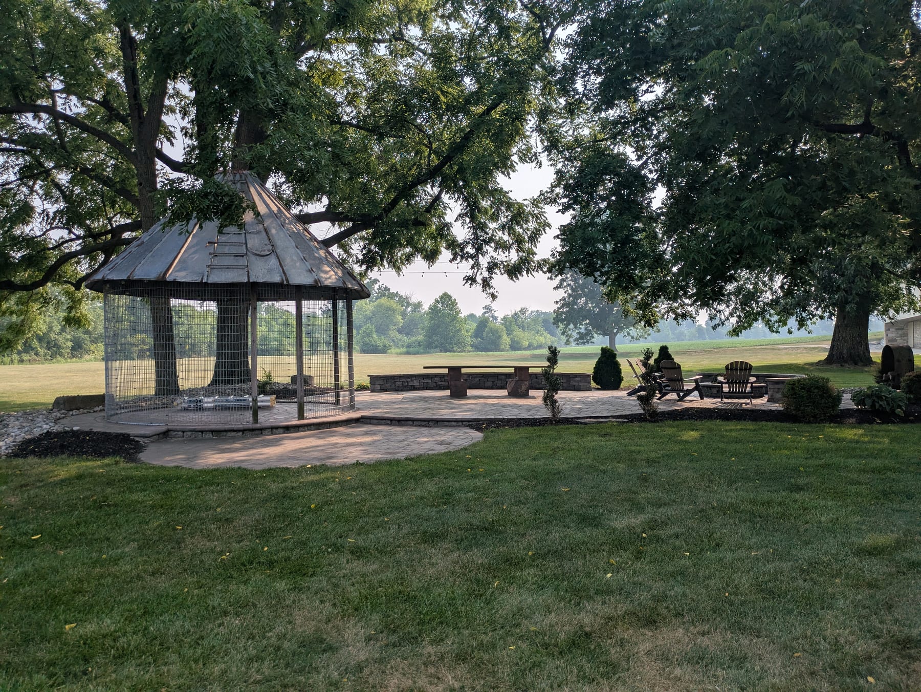 Outdoor patio and gathering space at the manor